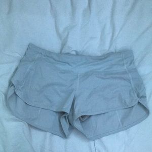 White lululemon speed up shorts.